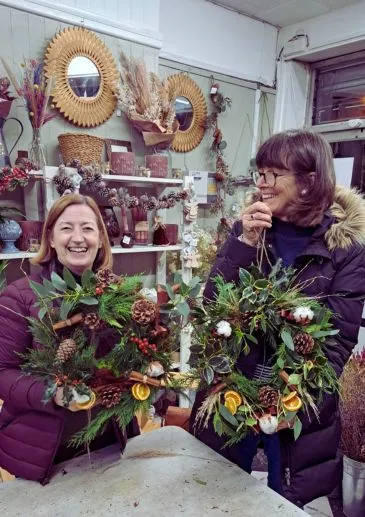 Make a Christmas door wreath class in Liverpool with local flower school booker flowers and gifts